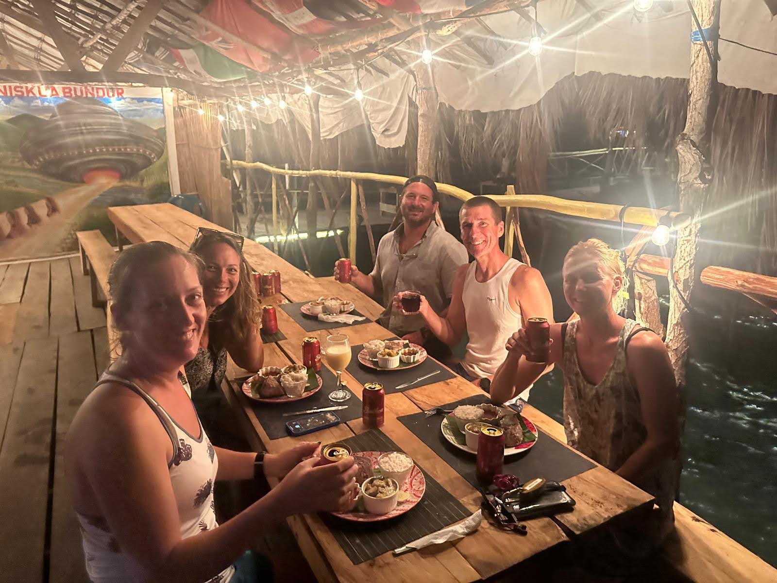 Group At Dinner Banedup Ufo In Background