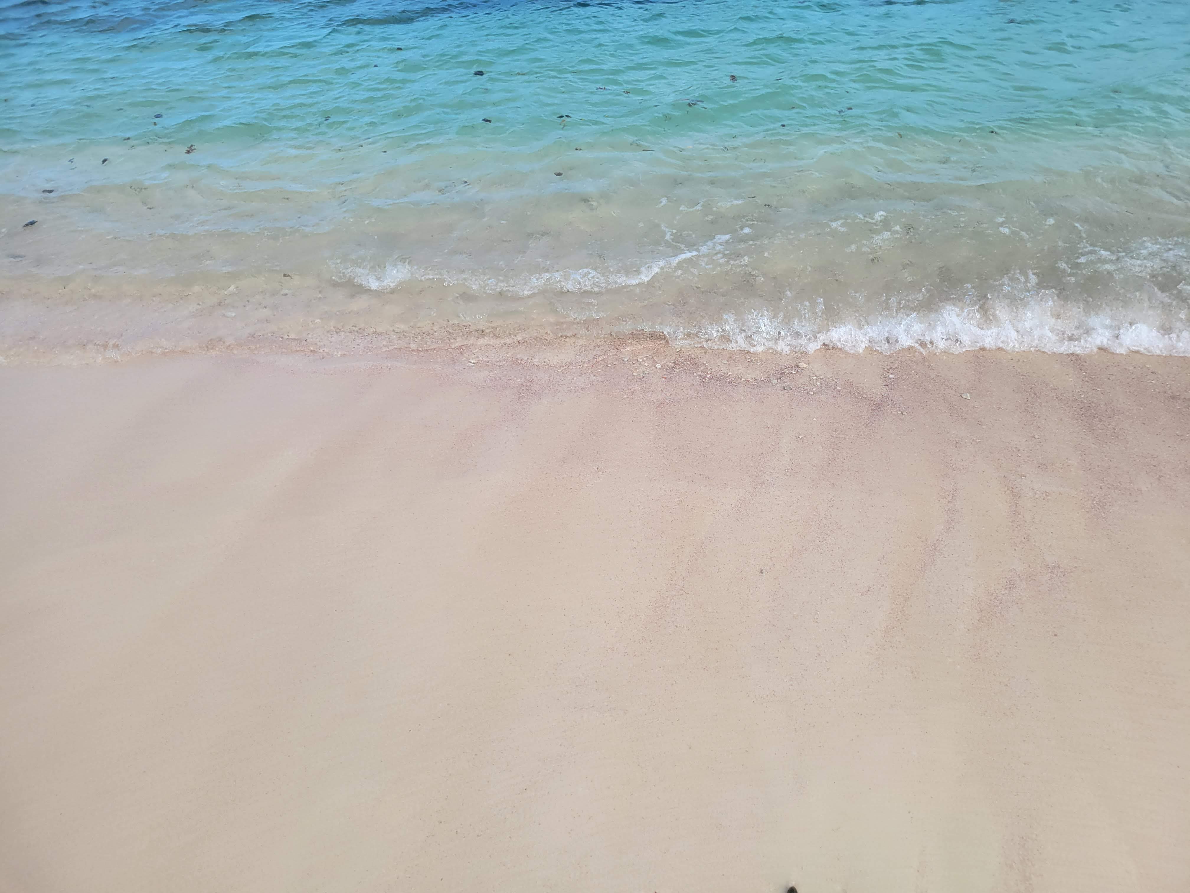 Red Sand On Sandy Island