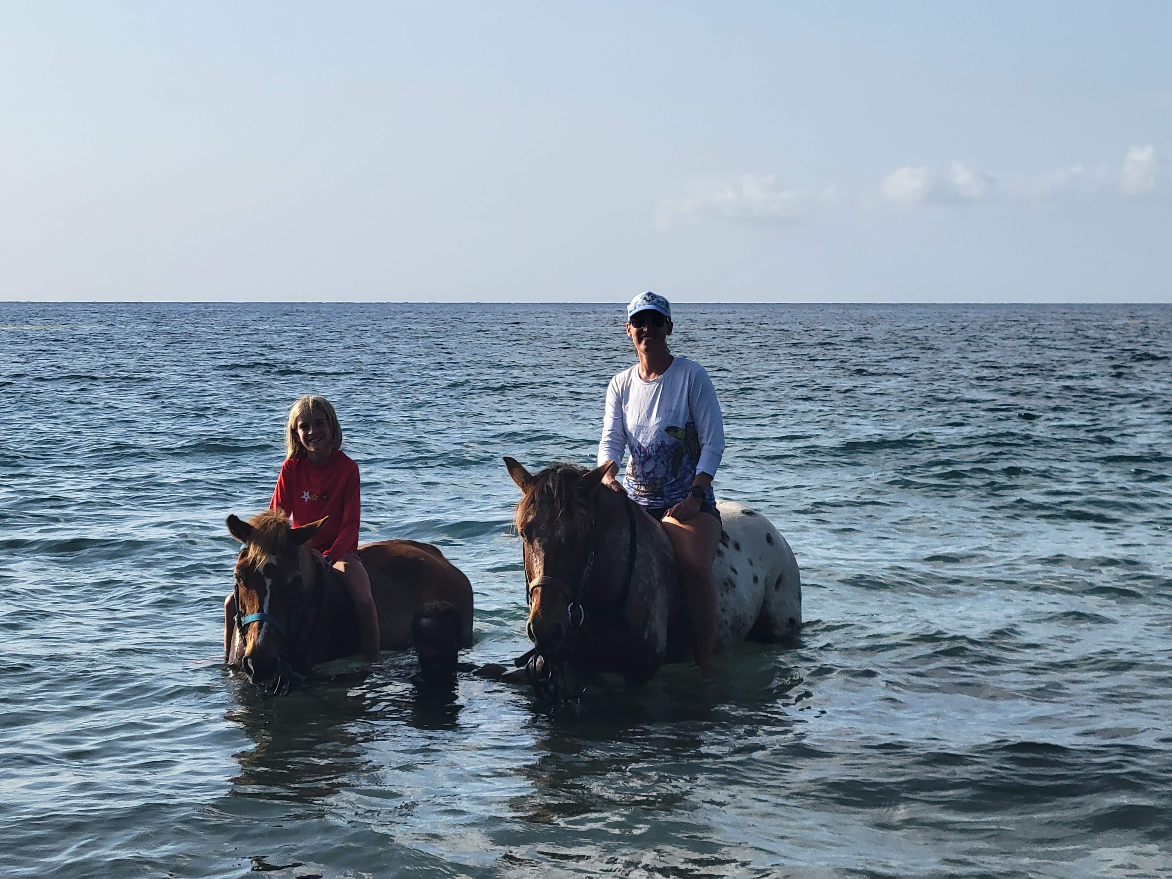 The Girls On Horses At The Beach