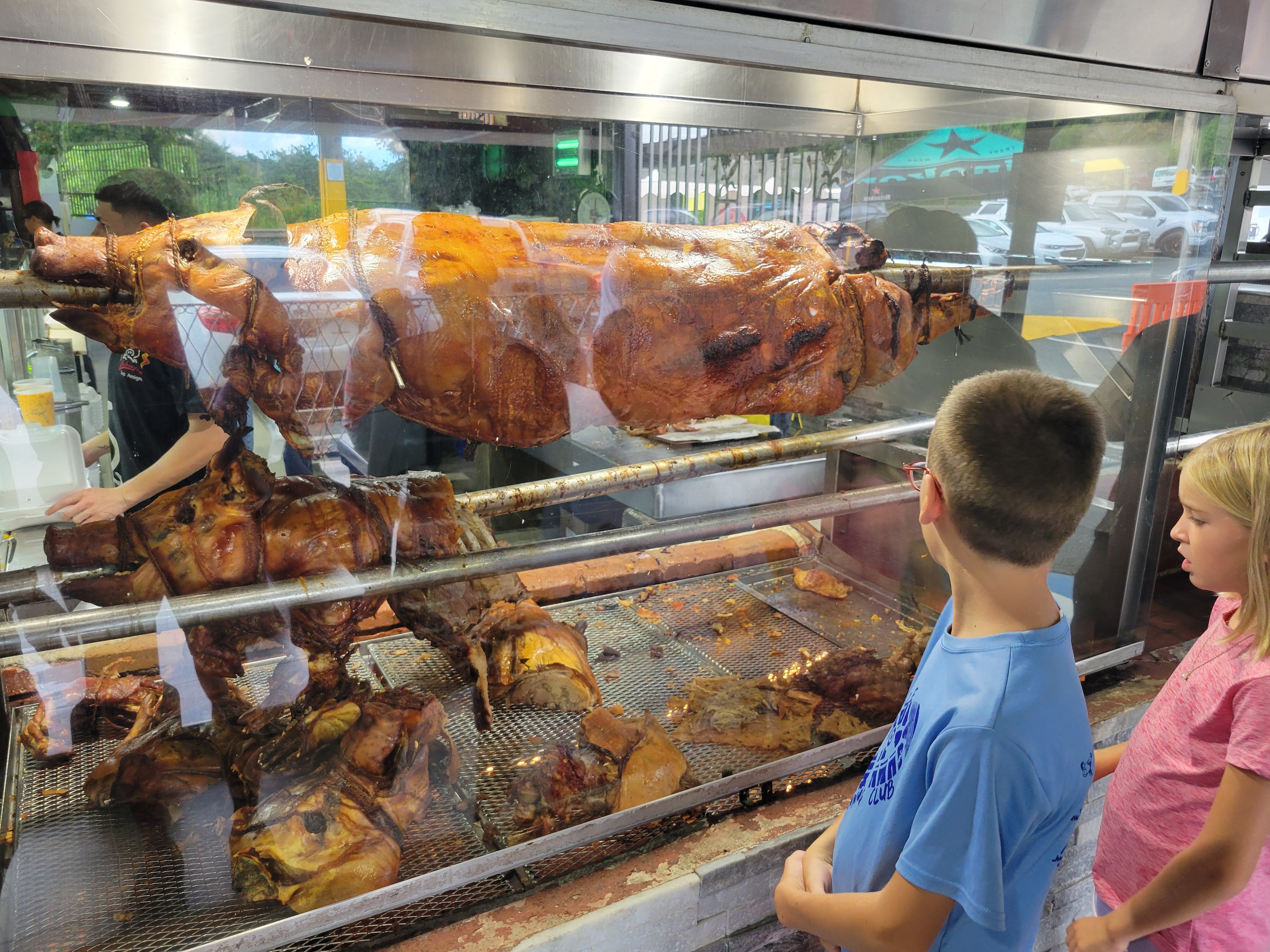 Watching The Pig On The Spit